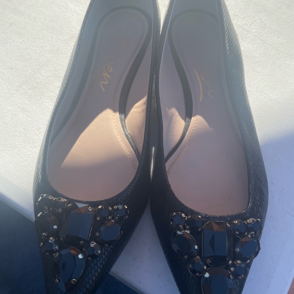 Black Rowen flats with black and dark purple rhinestones.